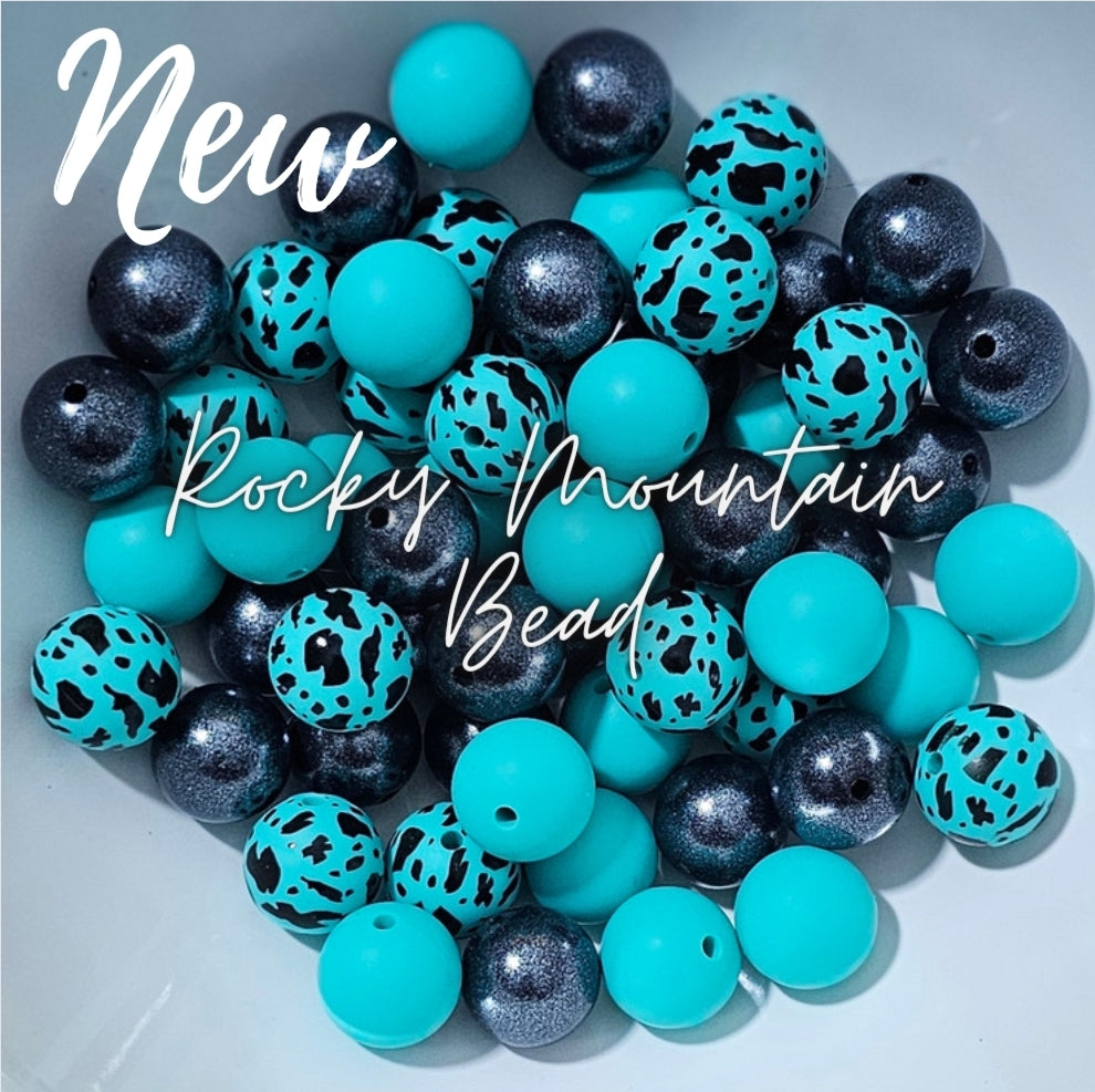 New- Teal cow Mix 15mm silicone includes opals