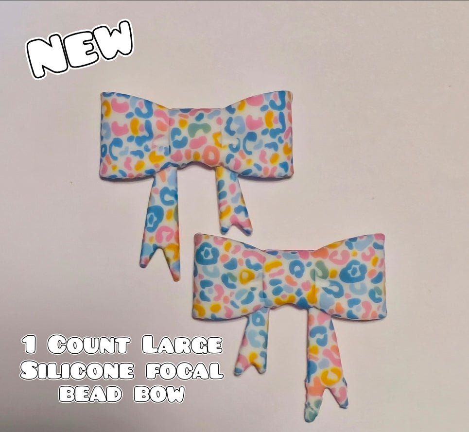1 Count Large Silicone Printed Bow Focal Beads. Bow beadable accessories