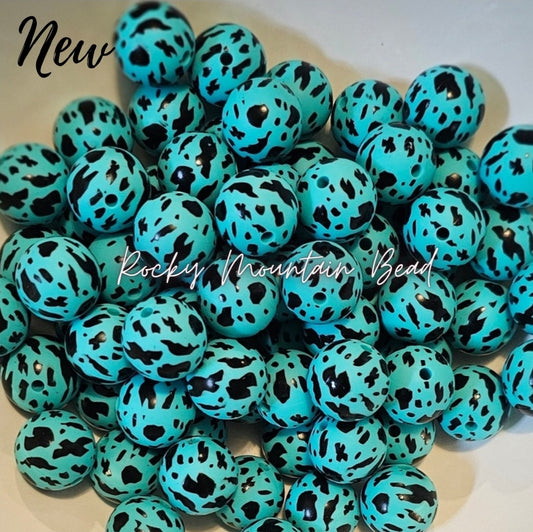 New 15mm printed black teal cow silicone beads 1 count