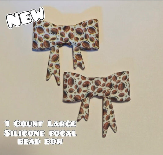 1 Count Large Silicone Printed Bow Focal Beads. Bow beadable accessories