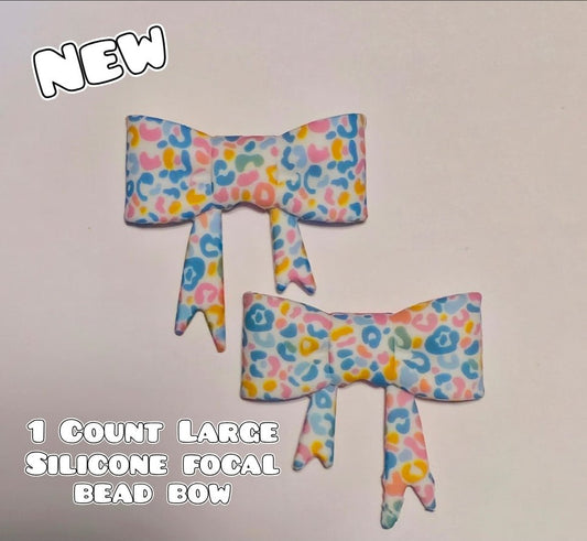 1 Count Large Silicone Printed Bow Focal Beads. Bow beadable accessories