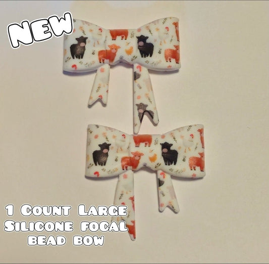 1 Count Large Silicone Printed Bow Focal Beads. Bow beadable accessories