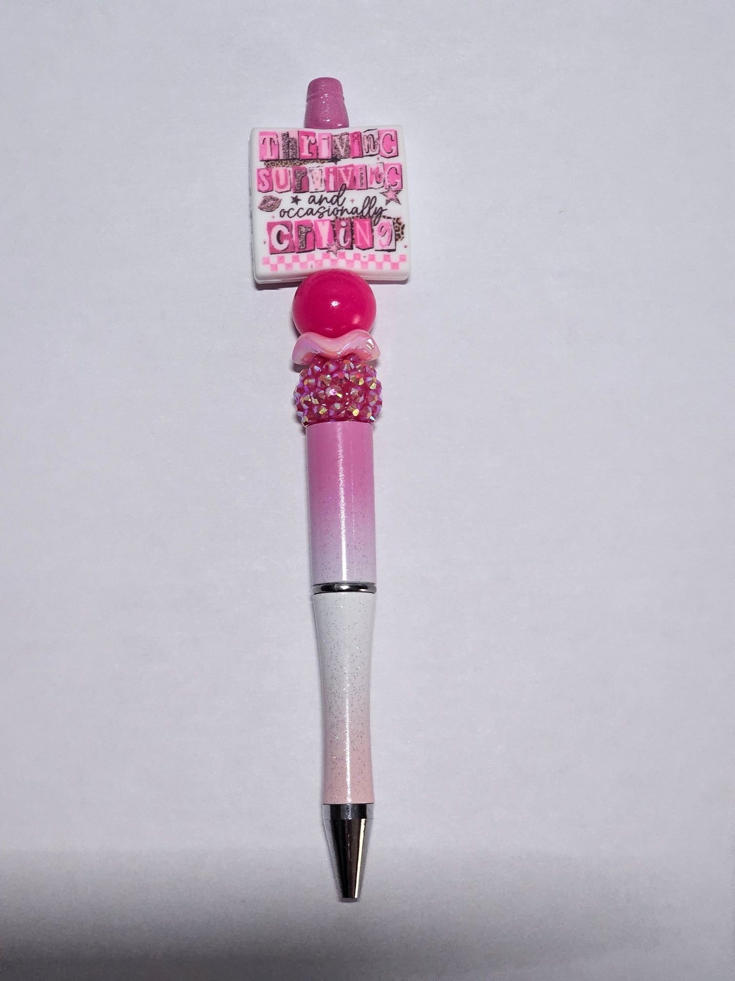 New 1 Count Focal Bead Thriving Surviving and occasionally crying.  Pen is example bead only