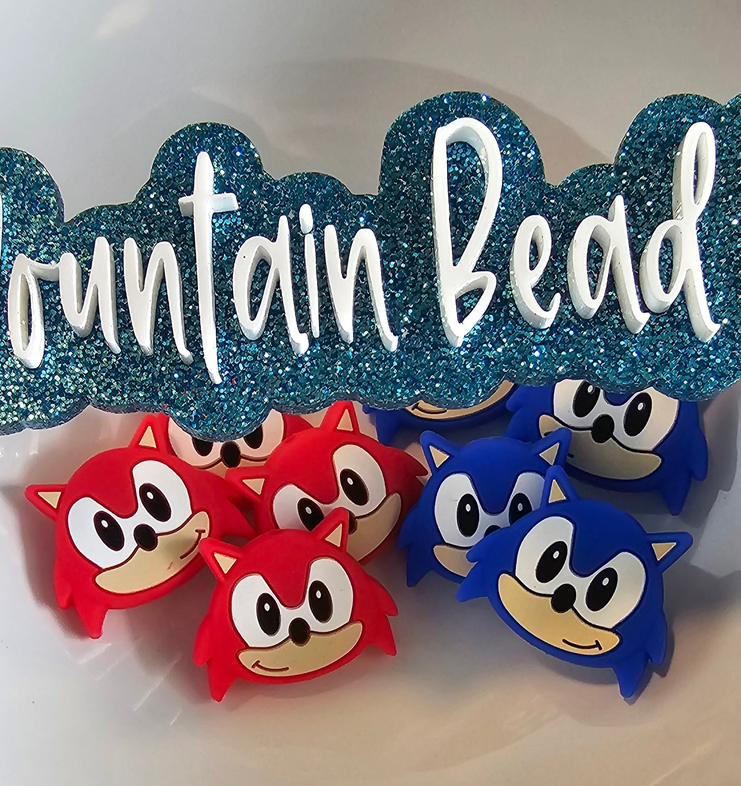 Blue- Red Head silicone bead 1 count